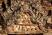 Thailand, Old Sukhothai - Wat Phra Pai Luang the pediment over the false West entrance of the prang contains a detailed stucco relief of the Buddha in the  calling the Earth to witness  mudra and a number of devotees. 